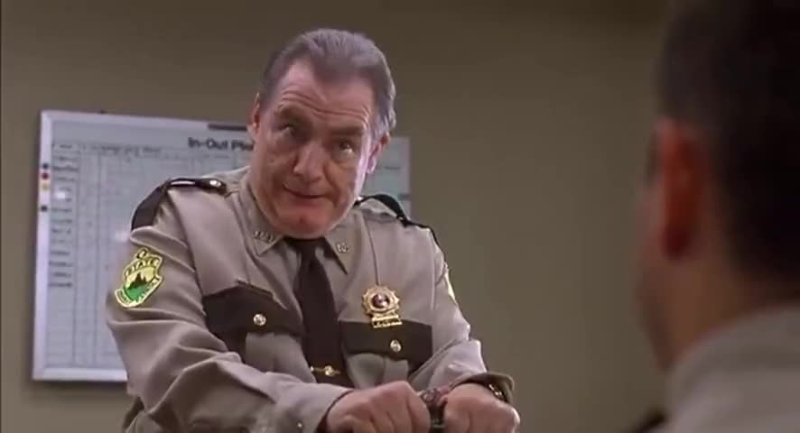 Clip of quote: - Who'll bust heads on the highway? - The goddamn local cops!