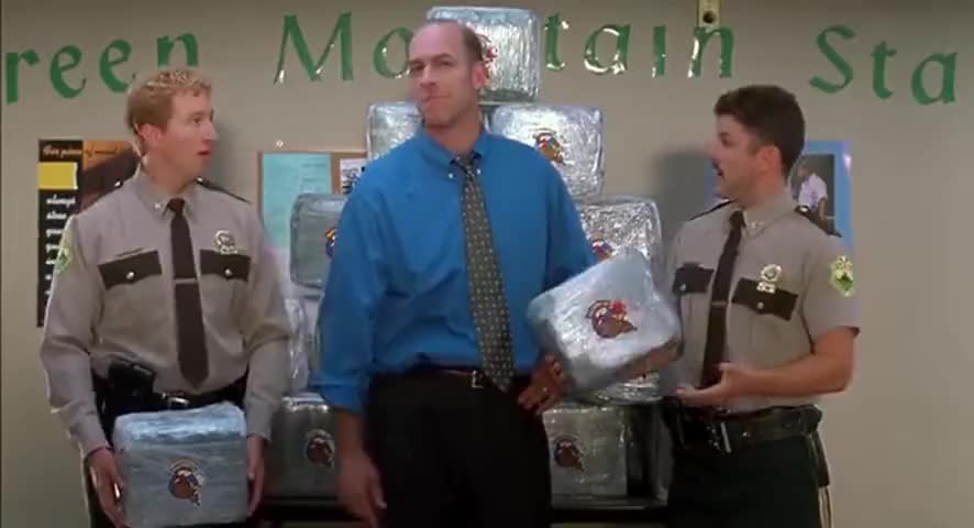 Clip of quote: Give me a gun, huh, to hold for the pictures.