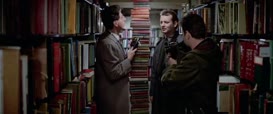 Clip of quote: You're Right. No Human Being Would Stack Books Like This.