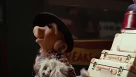 Clip of quote: Piggy. Why do you need so much luggage?