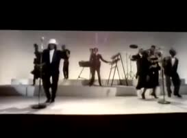 Clip of quote: Shake our bodies to the music.