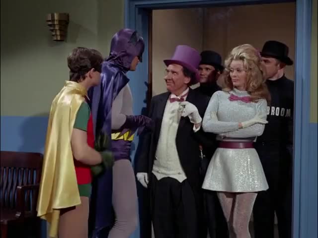 Clip of quote: You've been helping old ladies across the street, Batman? Hwah, hwah.