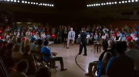 Clip of quote: ...who believes that everyone should live in Rainbow Land.