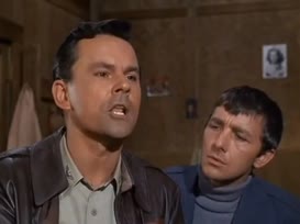 Clip of quote: clutching a prisoner of war by the throat.